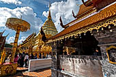 Chiang Mai - Wat Phra That Doi Suthep. The innercourtyard of the temple is filled with Buddha statues and other religious paraphenalia. 